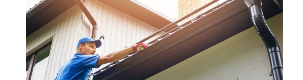 A man carefully climbs a ladder to inspect his roof.