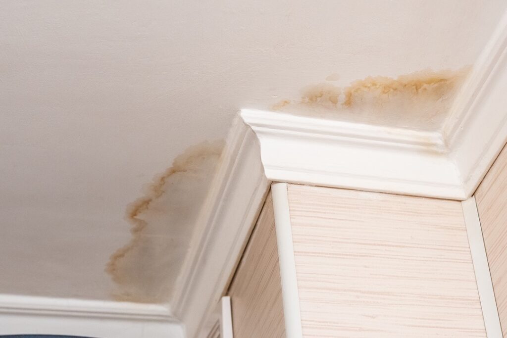 Water damage as a result of attic rain in home