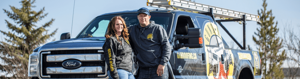 The owners of Guns N Hoses standing in front of their branded truck introducing the following paragraph about what to expect with our installation services.