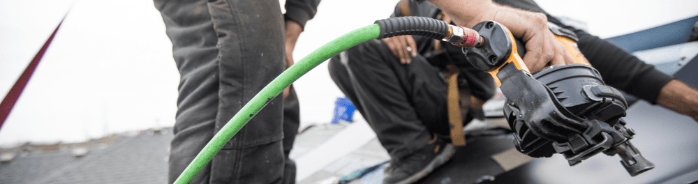 A close up image of a nail gun